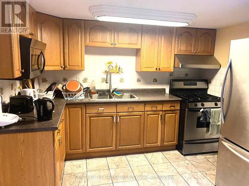 30 Romulus Drive, Toronto, ON - Indoor Photo Showing Kitchen With Double Sink