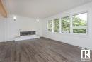 8803 145 St Nw, Edmonton, AB  - Indoor Photo Showing Living Room With Fireplace 