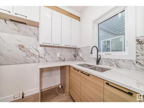 8377 Mayday Link Li Sw, Edmonton, AB - Indoor Photo Showing Kitchen With Double Sink