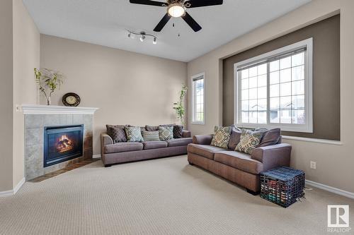 7719 7A Av Sw, Edmonton, AB - Indoor Photo Showing Living Room With Fireplace