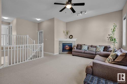 7719 7A Av Sw, Edmonton, AB - Indoor Photo Showing Living Room With Fireplace