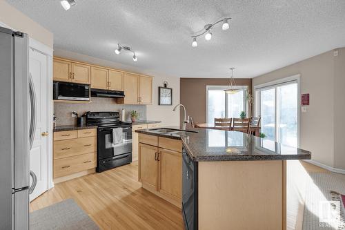 7719 7A Av Sw, Edmonton, AB - Indoor Photo Showing Kitchen