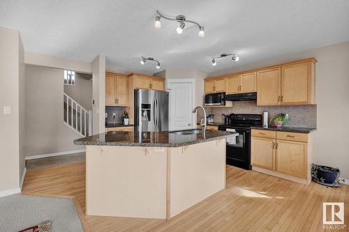 7719 7A Av Sw, Edmonton, AB - Indoor Photo Showing Kitchen With Double Sink