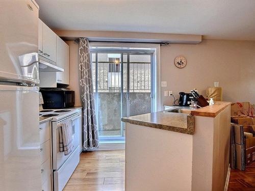 Basement - 360  - 364 Rue St-Henri, La Prairie, QC - Indoor Photo Showing Kitchen