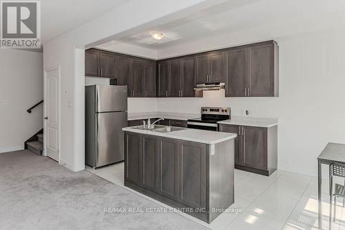 86 - 166 Deerpath Drive, Guelph, ON - Indoor Photo Showing Kitchen With Double Sink