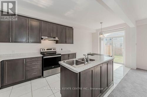 86 - 166 Deerpath Drive, Guelph, ON - Indoor Photo Showing Kitchen With Double Sink