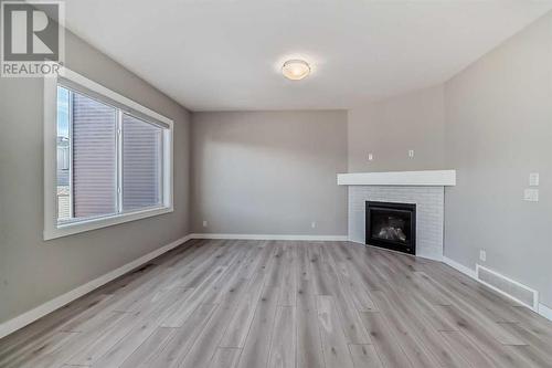 48 Nolanhurst Crescent Nw, Calgary, AB - Indoor Photo Showing Living Room With Fireplace