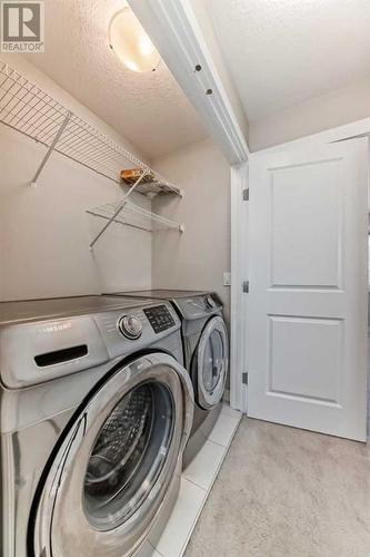 48 Nolanhurst Crescent Nw, Calgary, AB - Indoor Photo Showing Laundry Room