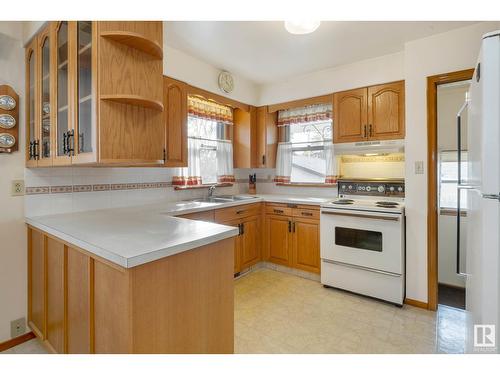 9912 79 St Nw, Edmonton, AB - Indoor Photo Showing Kitchen With Double Sink