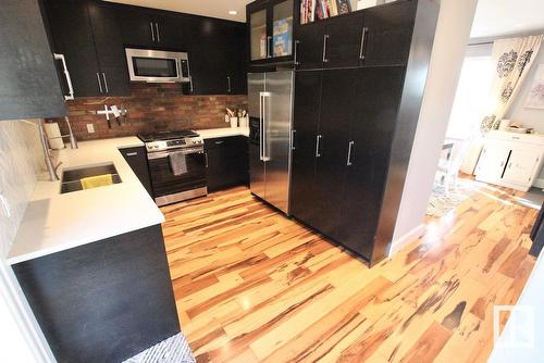 9215 153 St Nw, Edmonton, AB - Indoor Photo Showing Kitchen With Double Sink With Upgraded Kitchen