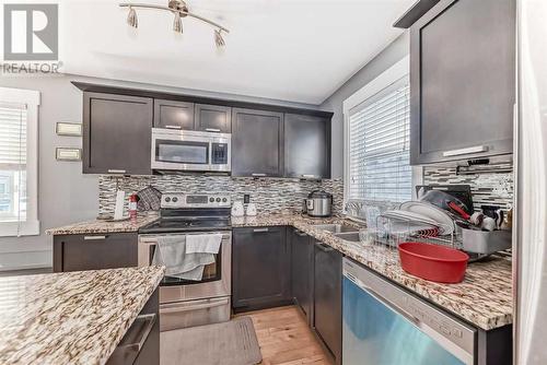 145 Skyview Point Green Ne, Calgary, AB - Indoor Photo Showing Kitchen With Double Sink With Upgraded Kitchen