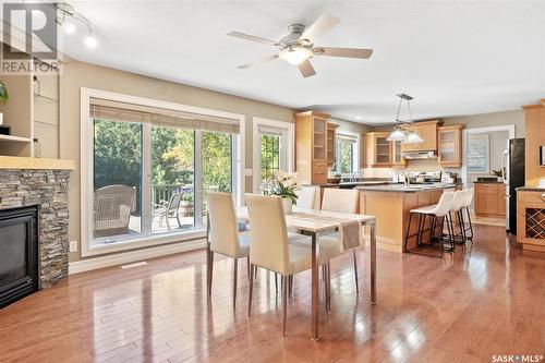 418 Bate Crescent, Saskatoon, SK - Indoor Photo Showing Dining Room With Fireplace