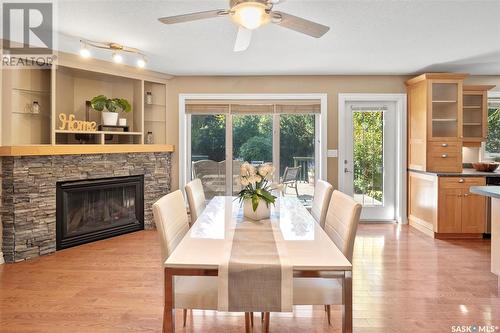 418 Bate Crescent, Saskatoon, SK - Indoor Photo Showing Dining Room With Fireplace