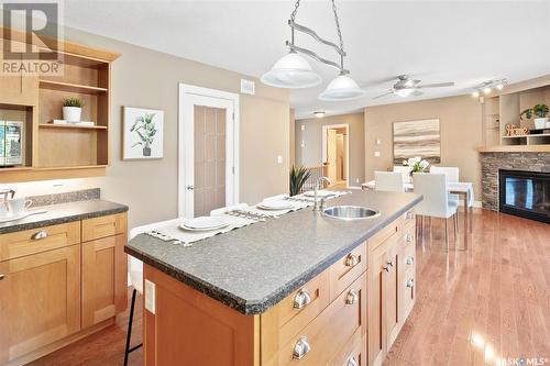 418 Bate Crescent, Saskatoon, SK - Indoor Photo Showing Kitchen With Fireplace