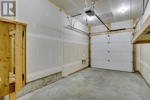 244 Shalestone Way Nw, Fort Mcmurray, AB - Indoor Photo Showing Garage