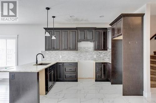 244 Shalestone Way Nw, Fort Mcmurray, AB - Indoor Photo Showing Kitchen With Upgraded Kitchen