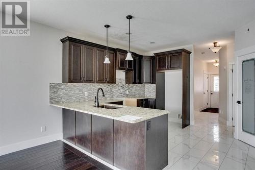 244 Shalestone Way Nw, Fort Mcmurray, AB - Indoor Photo Showing Kitchen