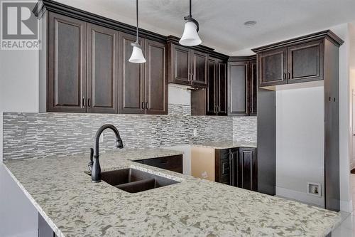 244 Shalestone Way Nw, Fort Mcmurray, AB - Indoor Photo Showing Kitchen With Double Sink With Upgraded Kitchen