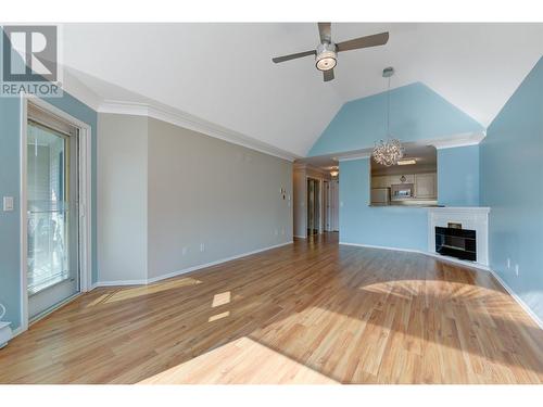 3283 Casorso Road Unit# 308, Kelowna, BC - Indoor Photo Showing Living Room With Fireplace