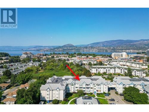 This photo has been modified by adding an arrow to locate the unit within the photo. - 3283 Casorso Road Unit# 308, Kelowna, BC - Outdoor With Body Of Water With View