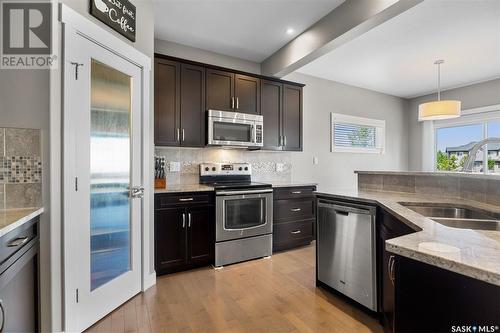 302 Pichler Crescent, Saskatoon, SK - Indoor Photo Showing Kitchen With Stainless Steel Kitchen With Double Sink