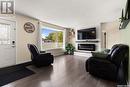 154 Lloyd Crescent, Regina, SK  - Indoor Photo Showing Living Room With Fireplace 