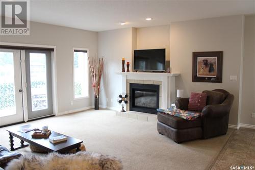 108 Erickson Street, Midale, SK - Indoor Photo Showing Living Room With Fireplace