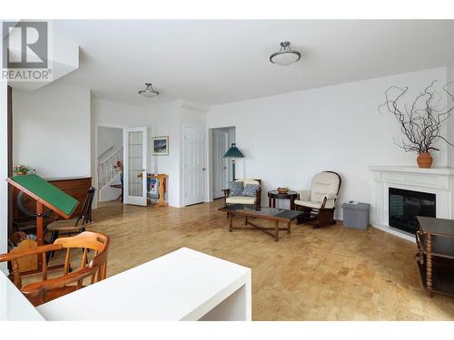 9110 Smith Road, Vernon, BC - Indoor Photo Showing Living Room With Fireplace