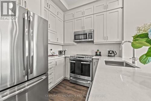 628 - 1105 Leger Way, Milton (Ford), ON - Indoor Photo Showing Kitchen With Stainless Steel Kitchen With Upgraded Kitchen