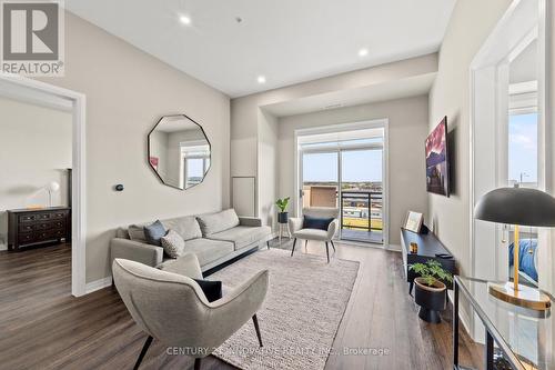 628 - 1105 Leger Way, Milton (Ford), ON - Indoor Photo Showing Living Room