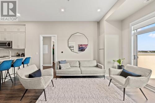 628 - 1105 Leger Way, Milton (Ford), ON - Indoor Photo Showing Living Room