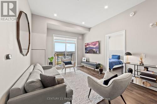 628 - 1105 Leger Way, Milton (Ford), ON - Indoor Photo Showing Living Room