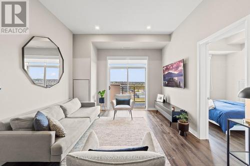 628 - 1105 Leger Way, Milton (Ford), ON - Indoor Photo Showing Living Room