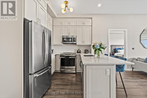 628 - 1105 Leger Way, Milton (Ford), ON - Indoor Photo Showing Kitchen With Stainless Steel Kitchen With Upgraded Kitchen