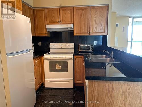 1005 - 7 Lorraine Drive, Toronto, ON - Indoor Photo Showing Kitchen With Double Sink