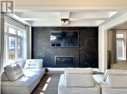 15 Protostar Avenue, Richmond Hill (Observatory), ON - Indoor Photo Showing Living Room With Fireplace