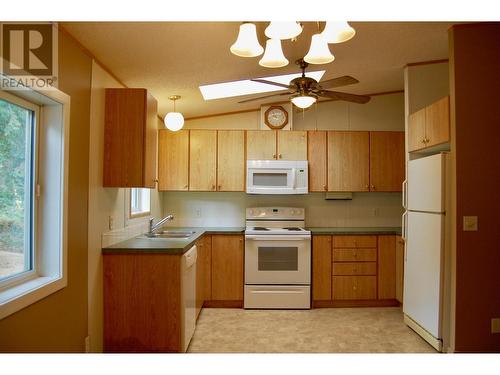 3530 Blewett  Road, Nelson, BC - Indoor Photo Showing Kitchen With Double Sink