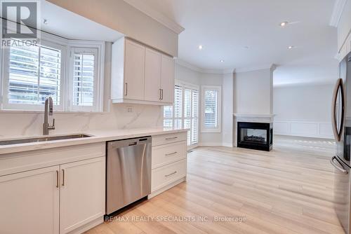 2432 Marisa Court, Mississauga, ON - Indoor Photo Showing Kitchen With Fireplace With Stainless Steel Kitchen With Double Sink