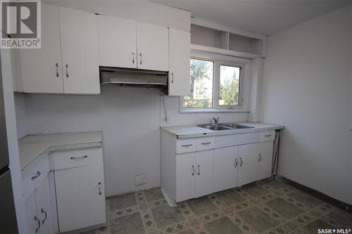 991 108Th Street, North Battleford, SK - Indoor Photo Showing Kitchen With Double Sink