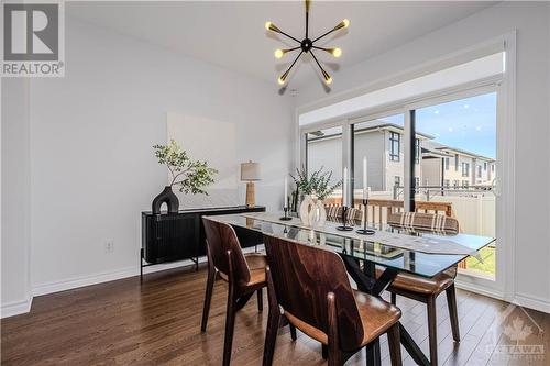 Bright Dining Room off kitchen with 3 panel sliding door to backyard - 600 Triangle Street, Ottawa, ON - Indoor Photo Showing Dining Room