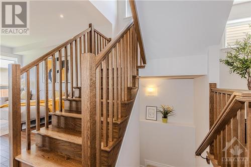 Elegant hardwood staircase - 600 Triangle Street, Ottawa, ON - Indoor Photo Showing Other Room