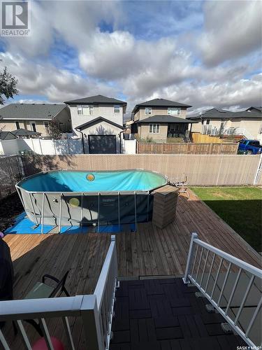 456 Byars Bay N, Regina, SK - Outdoor With Above Ground Pool