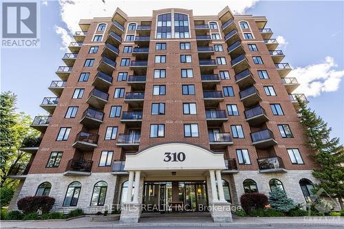 6A - 310 Central Park Drive, Ottawa, ON - Outdoor With Balcony With Facade