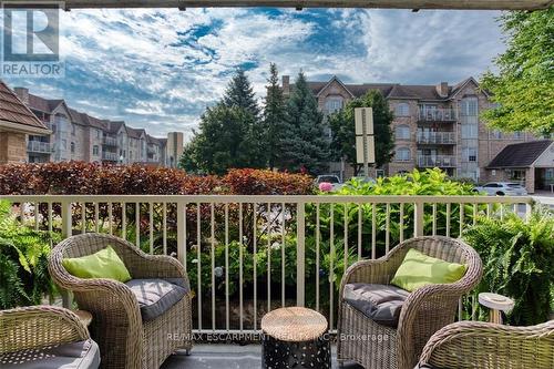 104 E - 216 Plains Road W, Burlington, ON - Outdoor With Balcony