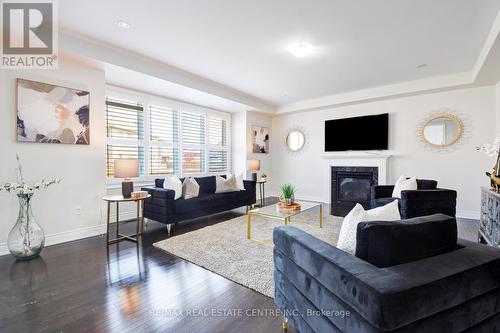 7 Fanning Trail, Brampton, ON - Indoor Photo Showing Living Room With Fireplace