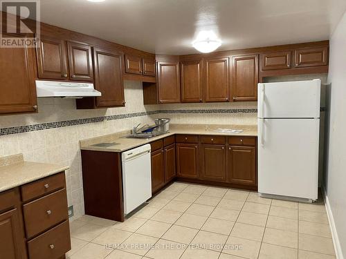 101 - 80 Kennedy Road N, Brampton, ON - Indoor Photo Showing Kitchen With Double Sink