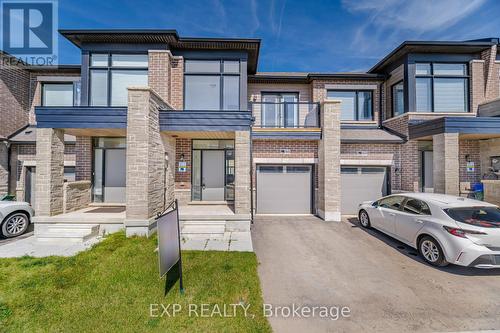 1545 Rose Way, Milton (Cobban), ON - Outdoor With Balcony With Facade