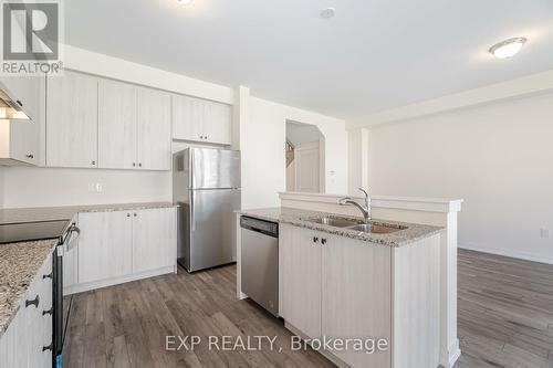 1545 Rose Way, Milton (Cobban), ON - Indoor Photo Showing Kitchen With Double Sink