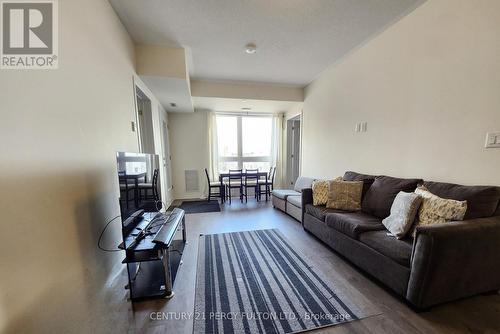 402 - 2 Adam Sellers Street, Markham (Cornell), ON - Indoor Photo Showing Living Room