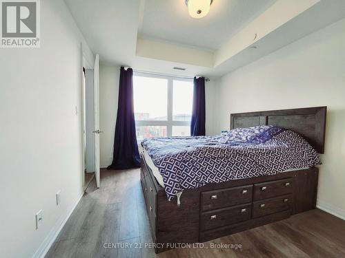 402 - 2 Adam Sellers Street, Markham (Cornell), ON - Indoor Photo Showing Bedroom